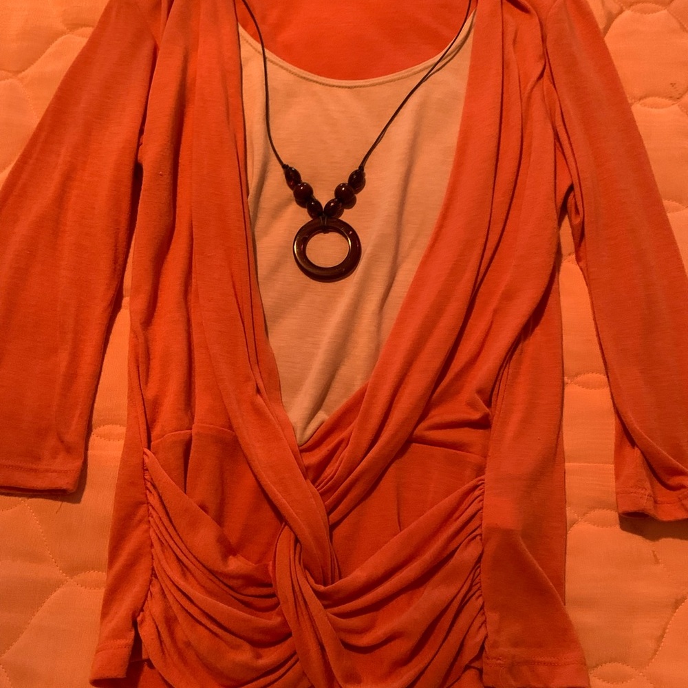 Orange top size large.worn one time. DressBarn